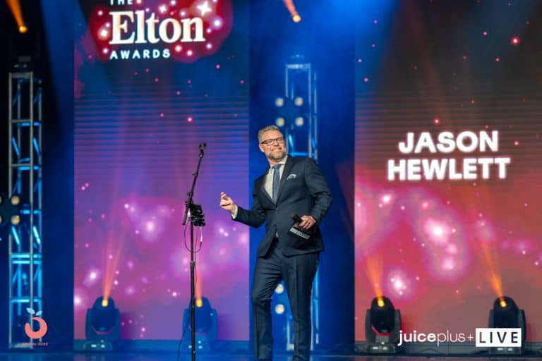 Jason Hewlett hosts the JuicePlus Elton Awards dancing