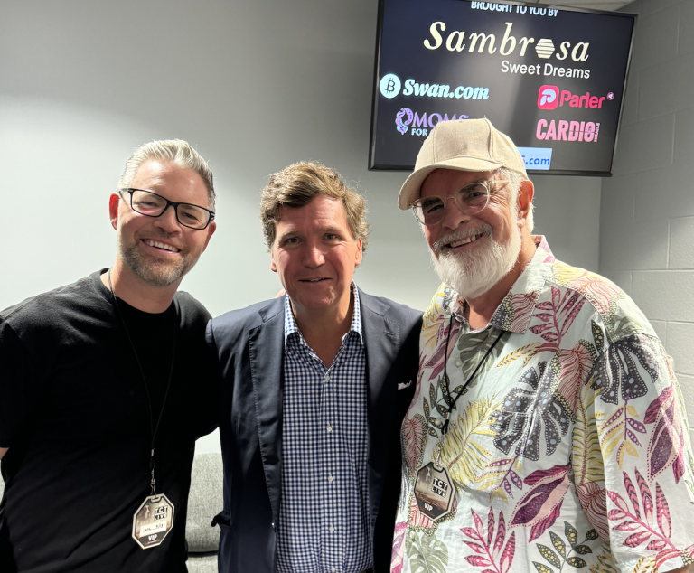 Tucker Carlson with John Hewlett, Founder of Cardio Miracle, and Jason Hewlett photo